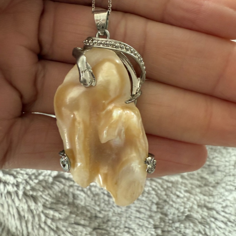 Elegant Pearlescent Pendant and Necklace